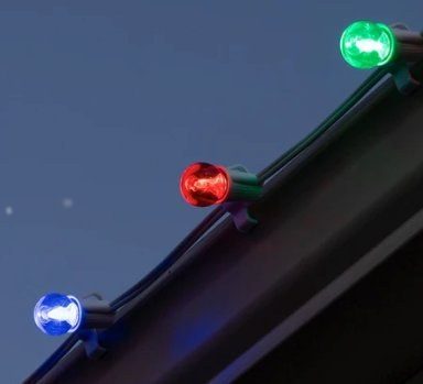 G30 round globe LED bulbs in red, green and blue along a roofline